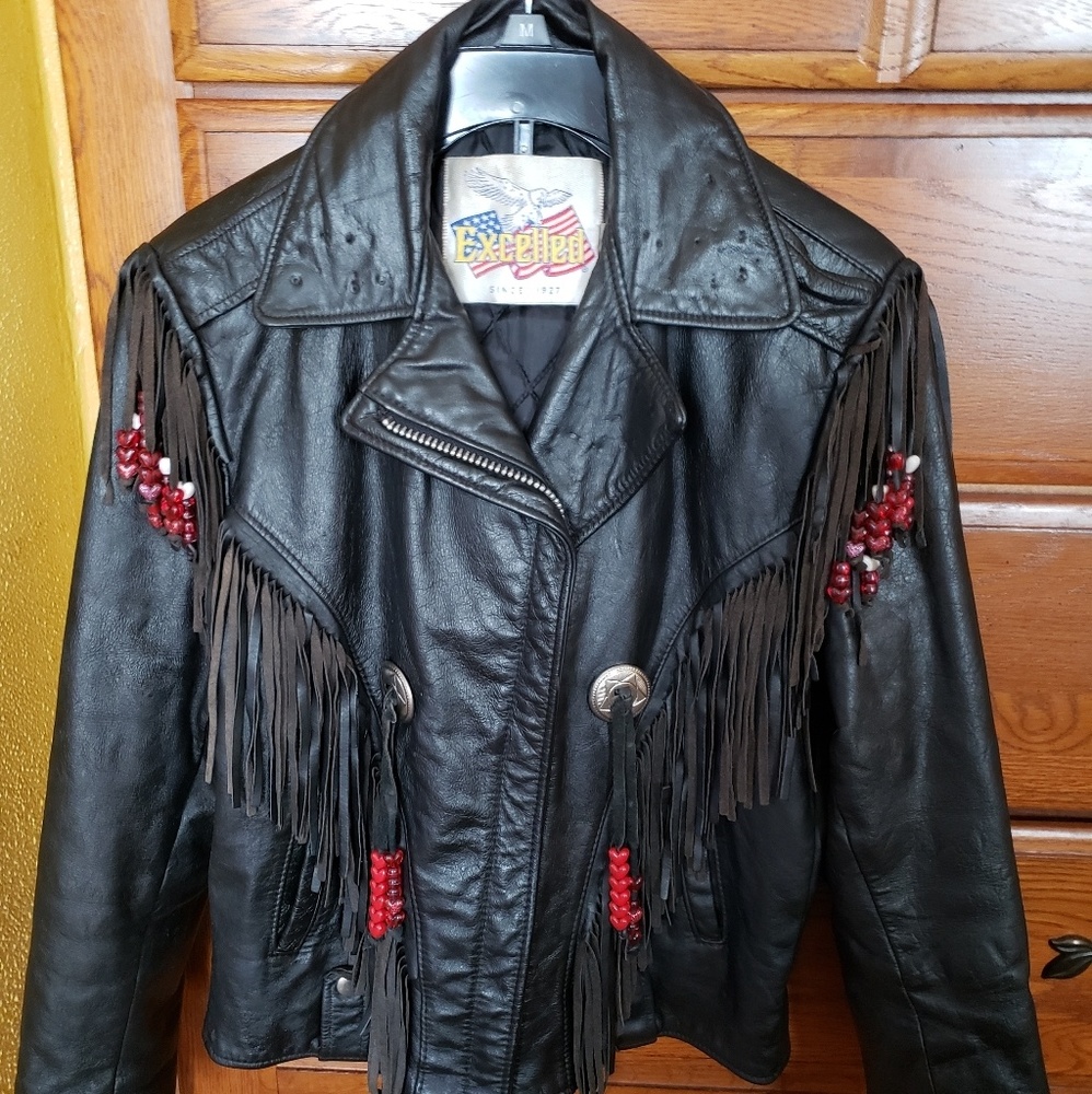 Leather jacket with fringes.